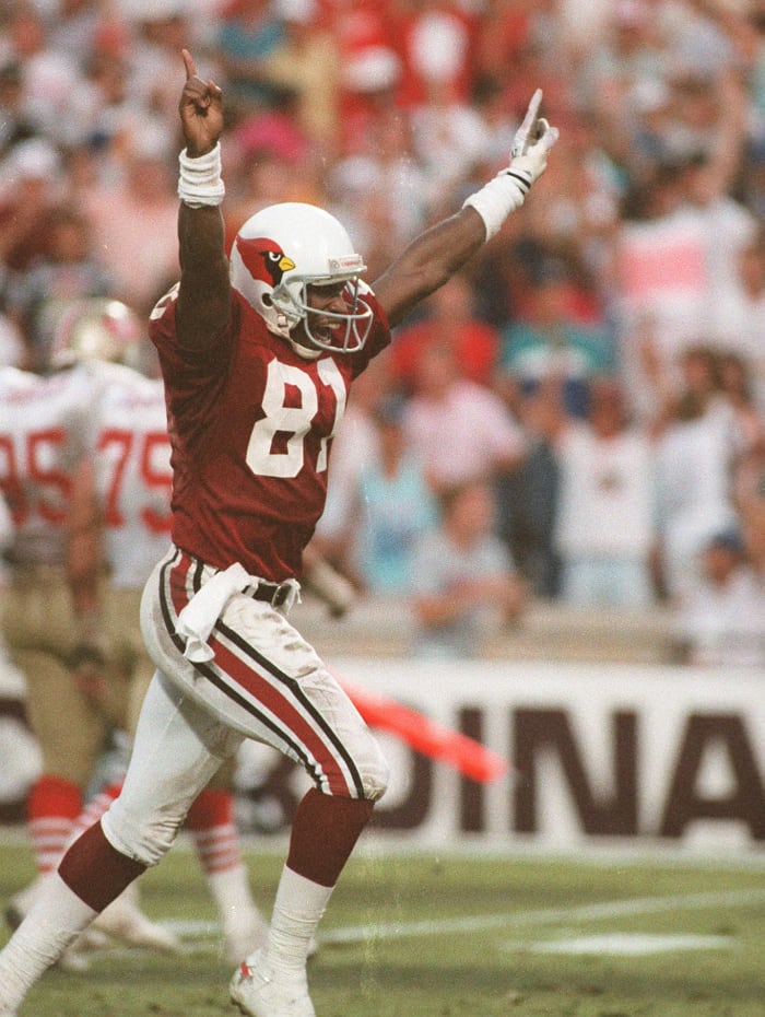 Cardinals receiver Roy Green celebrates after scoring a game-tying touchdown against the 49ers in 1988.